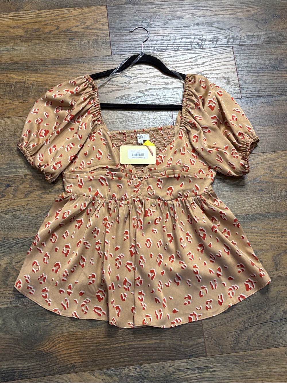 entro Tan Peplum Top with Red Abstract Spots